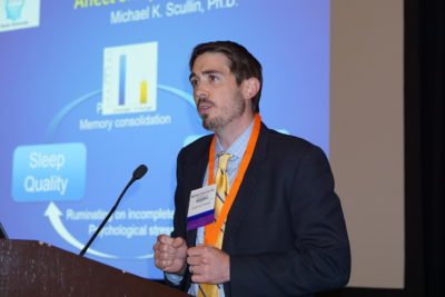 image of trainee speaking at conference